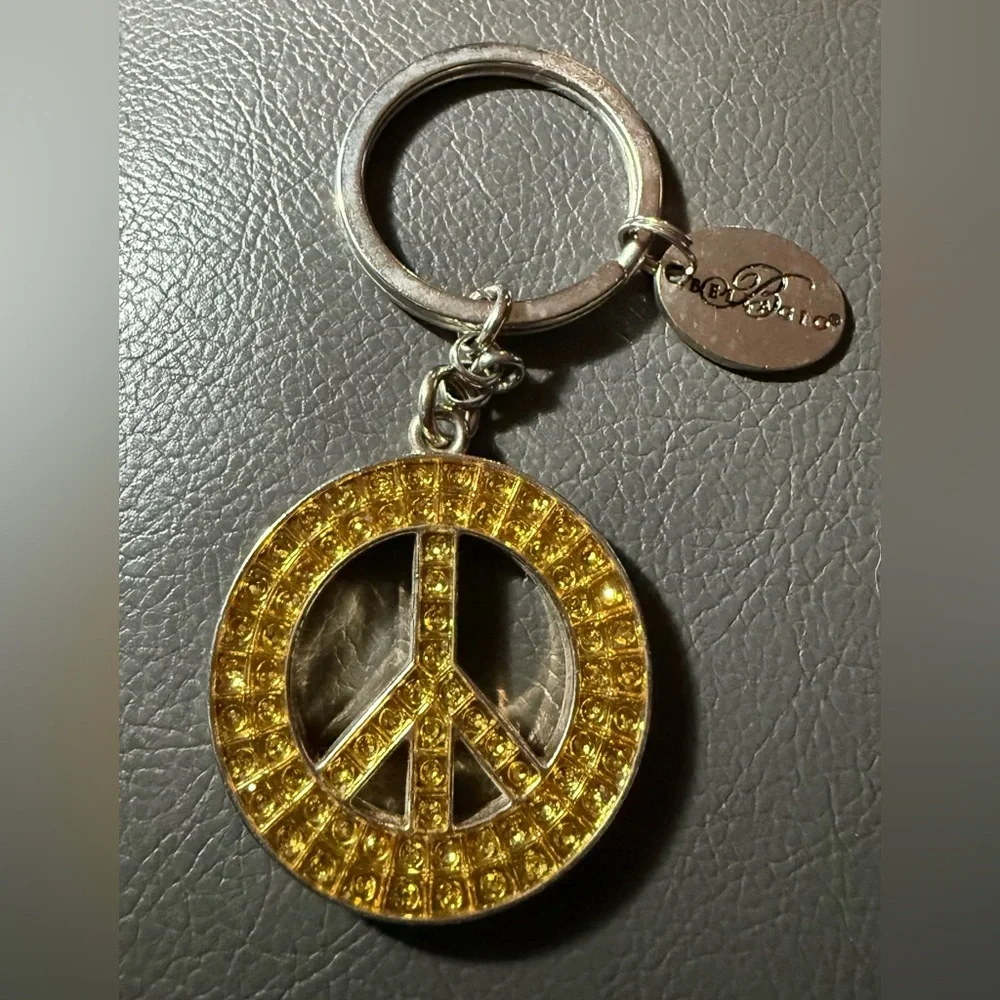 Belagio Hotel Yellow Peace Sign Keychain.